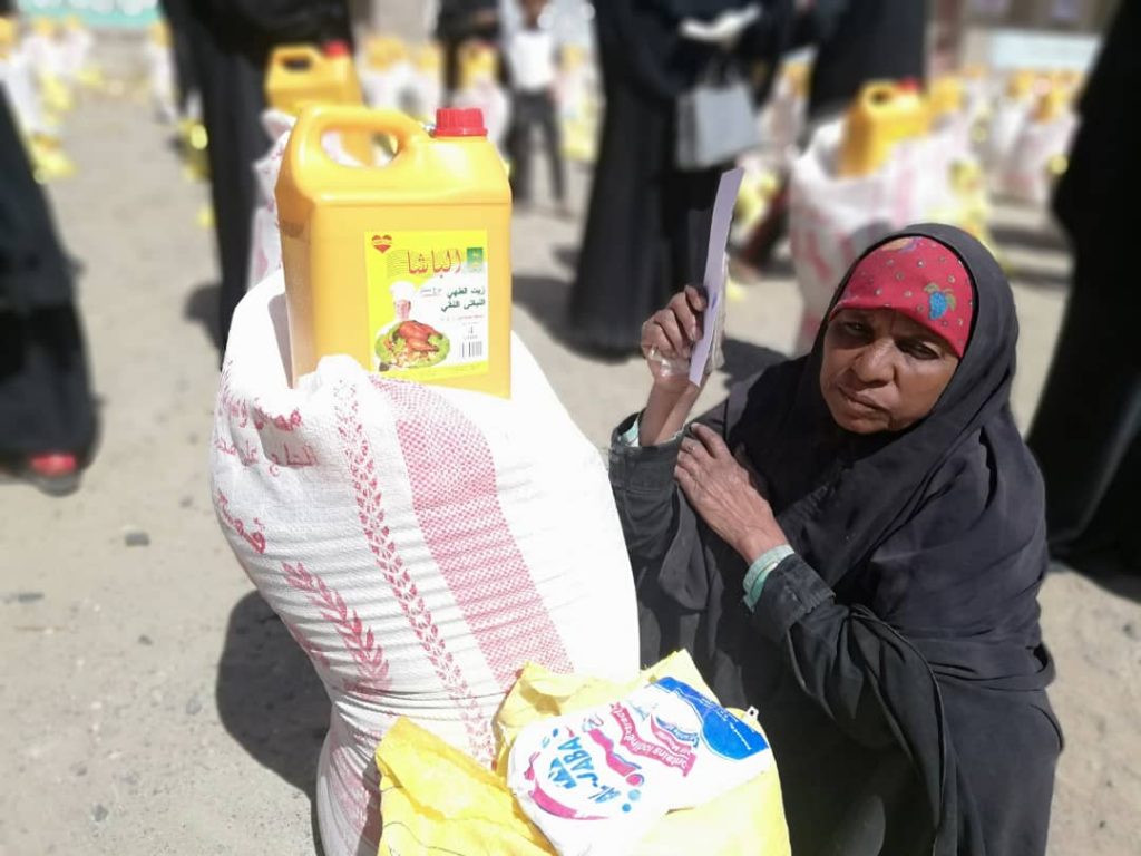 distributed food basket to a number of displaced people